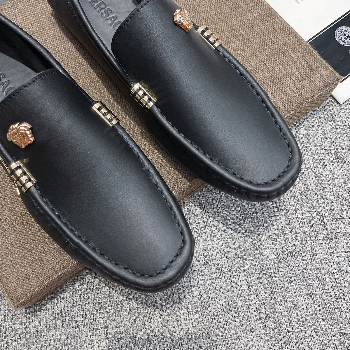 Versace Black Leather Loafers with Gold-Tone Accents